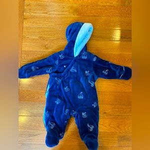 First Impressions baby boy snowsuit. Soft blue cotton keeps baby warm and snug.